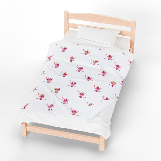 Soft velveteen throw blanket on bed - plush floral design for bedroom decor