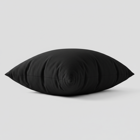 Black pillow from low angle showing puffiness