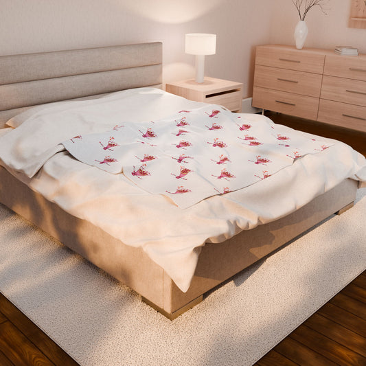 Cozy velveteen plush blanket on bed with floral pattern - soft throw for home decor