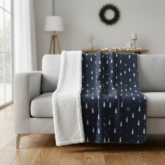 Two blankets draped over a sofa in a living room setting.