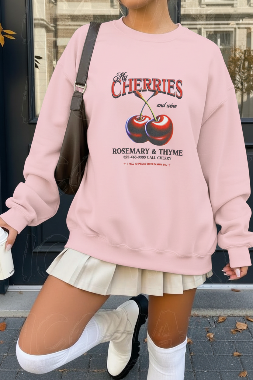 Light pink My Cherries sweatshirt flat lay showing vintage cherry and wine graphic design