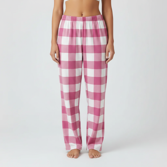 Women's pink and white gingham plaid pajama pants on model - comfortable loose fit sleepwear